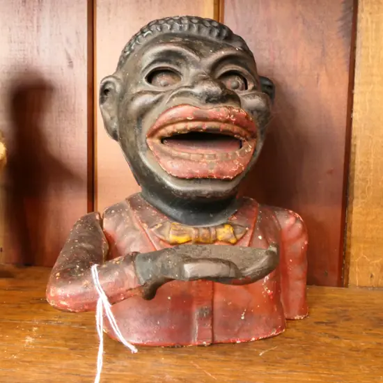 CAST IRON JOLLY MECHANICAL MONEY BANK H.170MM 12