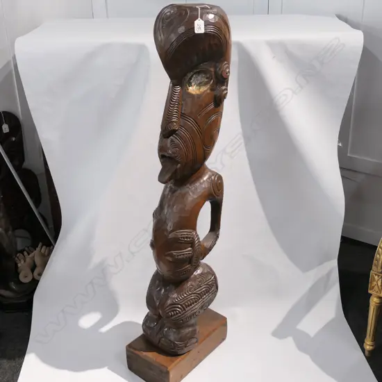 TALL MAORI CARVED FIGURE STYLISED. PAUA EYES