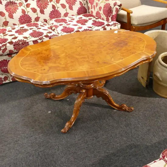 ITALIANATE BURR WALNUT COFFEE TABLE ONPEDESTAL BASE. 1160 x 700 x 500mm.