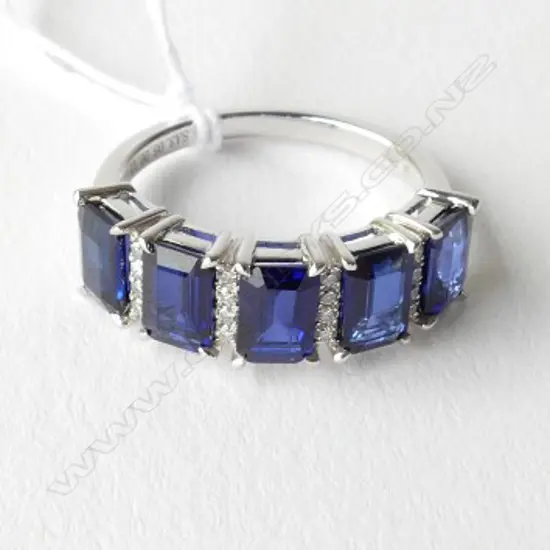 14ct White Gold Sapphire and Diamond ring featuring centre