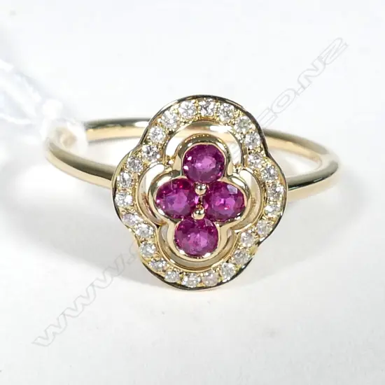 14ct Yellow Gold Ruby and Diamond ring featuring centre