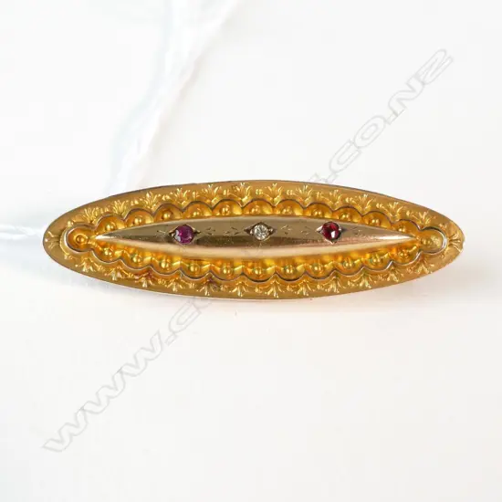 EDW 9CT GOLD RUBY DIA. BROOCH 2.54GMS