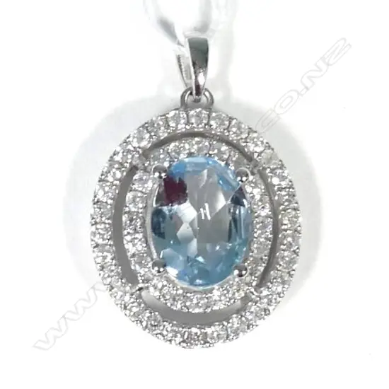 14ct White Gold Aquamarine and Diamond pendant featuring centre