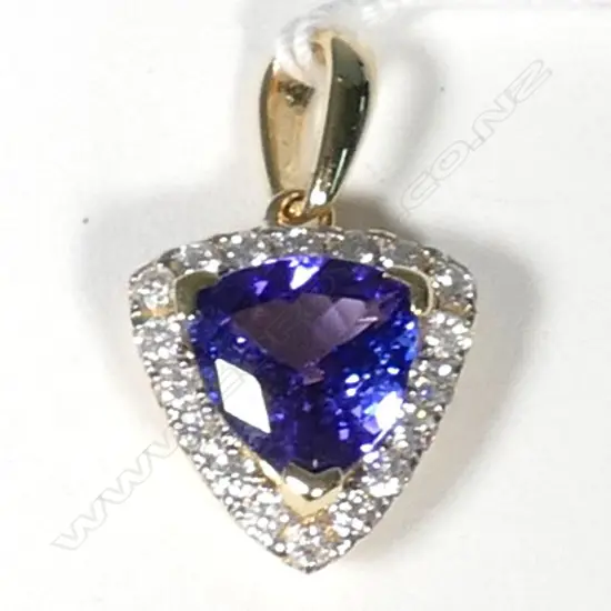 14ct Yellow Gold Tanzanite and Diamond pendant featuring centre