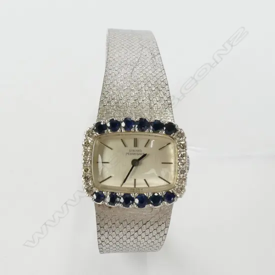 18CT W/GOLD GIRARD PERREGAUX WATCH  sapp. & dia.