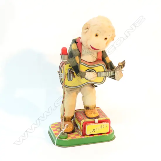 A JAPANESE B/O GUITAR PLAYING MONKEY H 330 MM