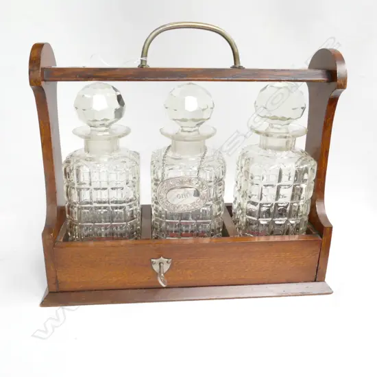 OAK TANTALUS WITH THREE DECANTERS (SOME CHIPS) & GIN DECANTER TICKET