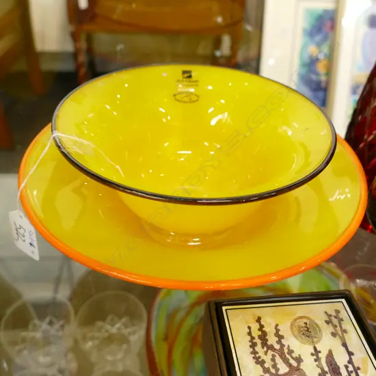 TWO HOGLUND YELLOW GLASS BOWLS. Dia.220 & 170mm