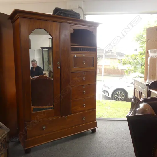 A colonial burr kauri wardrobe