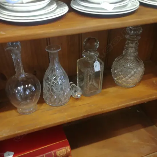 4 CRYSTAL DECANTERS 