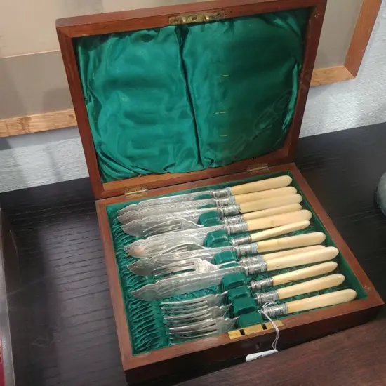 BOXED IVORY HANDLED KNIFE/FORK SET 17535