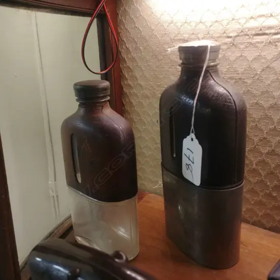 2 LEATHER TOPPED HIP FLASKS 