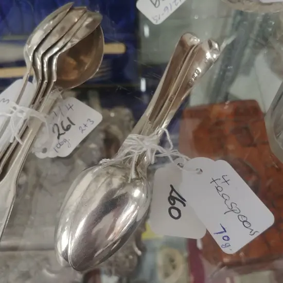 4 STERLING SILVER TEASPOONS 70G.