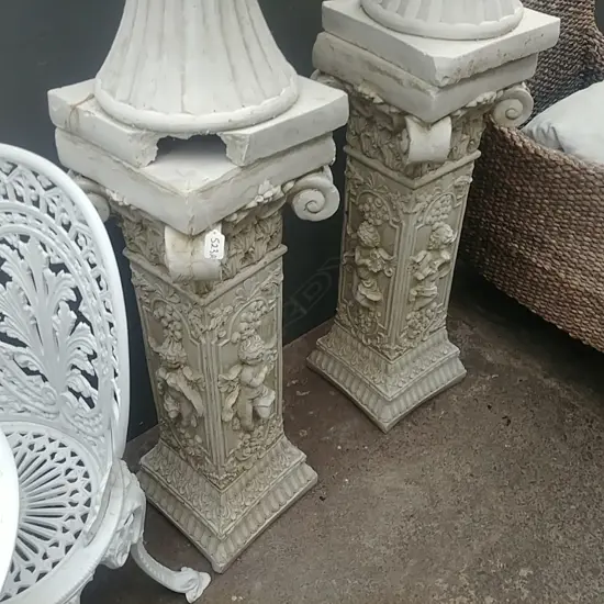 TWO COMPOSITE PLINTHS