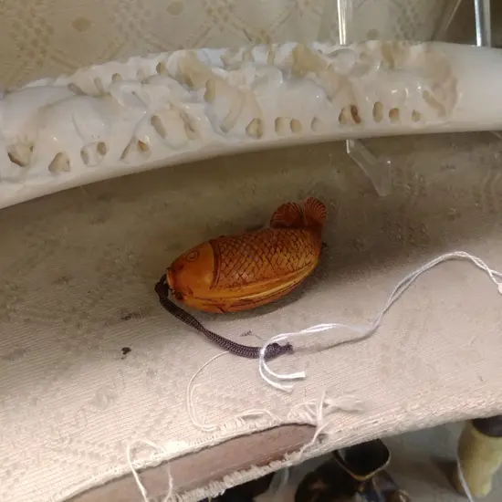 CARVED FISH W. SCENES INSIDE