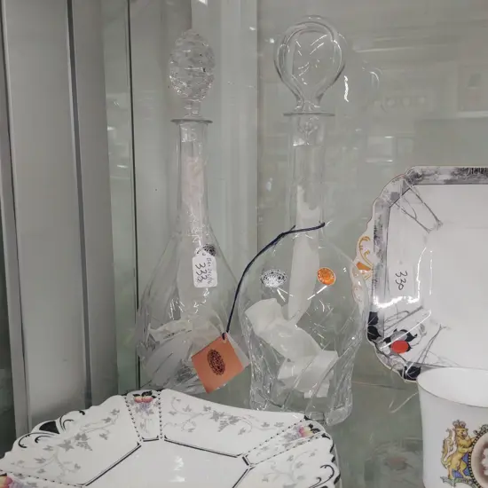 2 CUT CRYSTAL DECANTERS