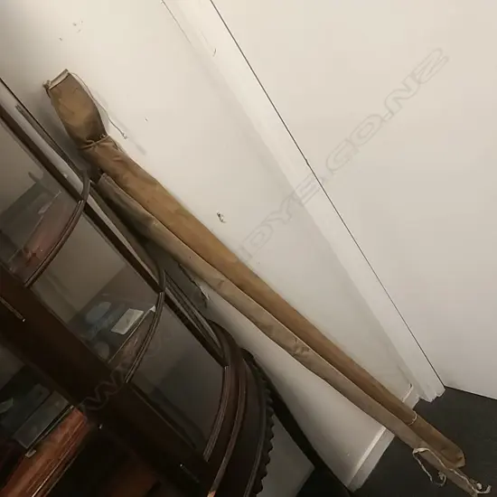 TWO VINTAGE FISHING REELS IN CANVAS BAGS