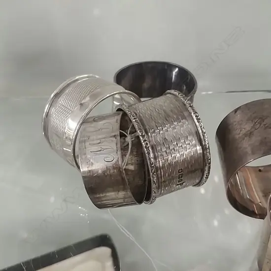 4 S/S NAPKIN RINGS