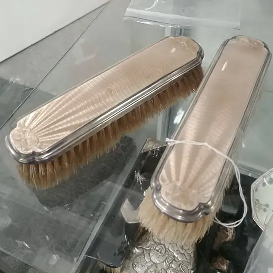 PAIR OF STG BACKED DECO BRUSHES