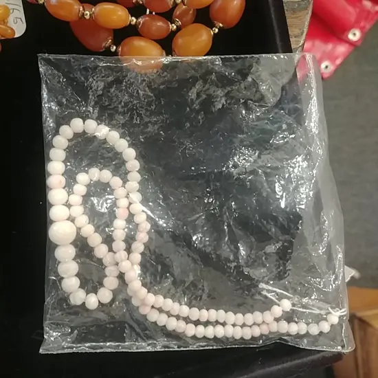 A vintage angel skin coral bead necklace