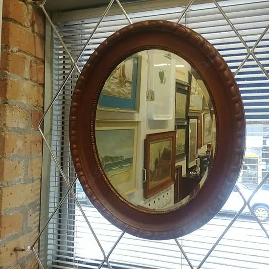 OVAL GILT WALL MIRROR