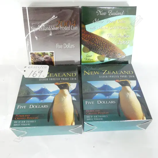 FOUR BOXED 5$ SILVER COINS