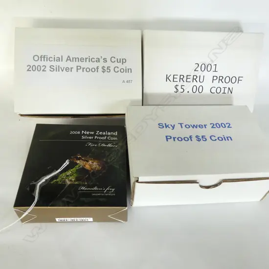 FOUR BOXED 5$ SILVER COINS