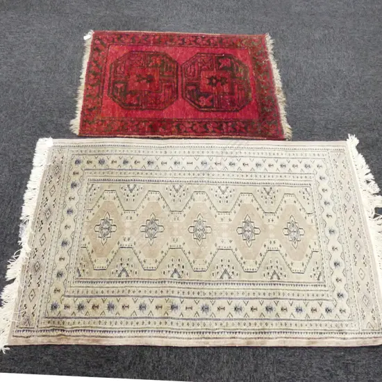 TWO OLD HAND KNOTTED RUGS