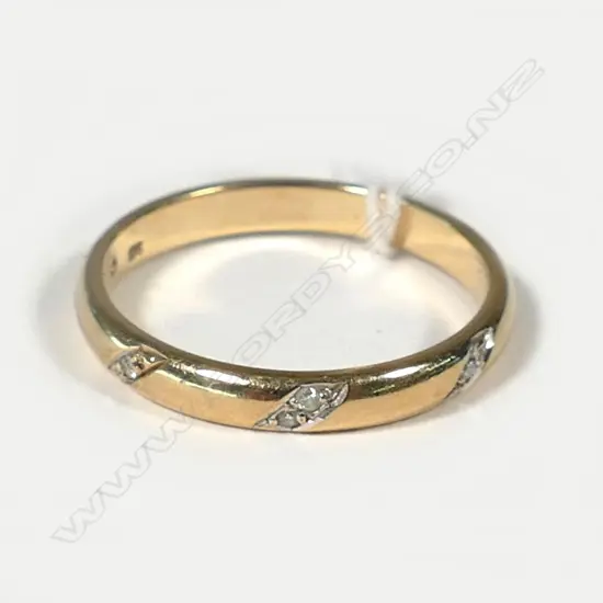 9CT GOLD AND DIAMOND SET BAND (RETAIL REPLACEMENT $695)