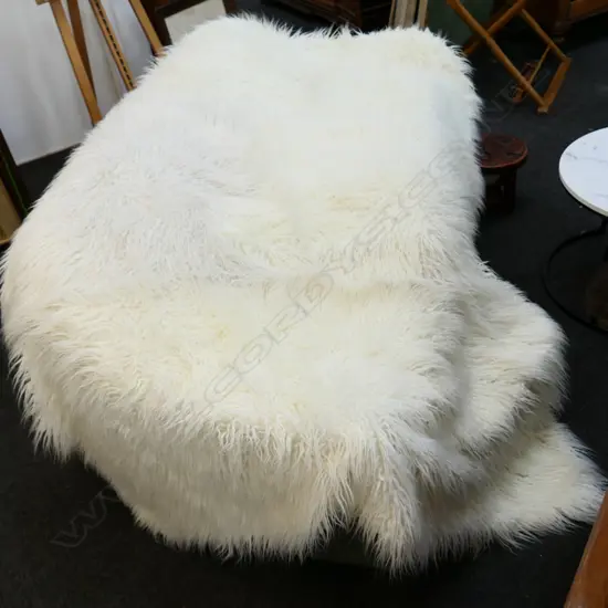 TWO FLOKATI THROWS, man made.