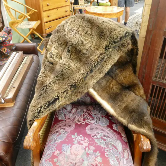 TWO POSSOM FUR THROWS