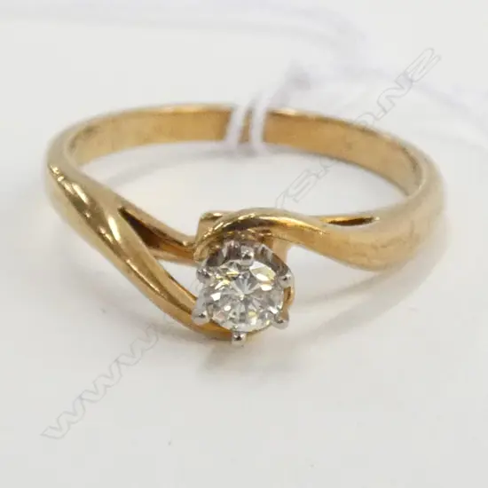 9ct DIAMOND SOLITAIRE RING 'MH' APPROX 0.25CT