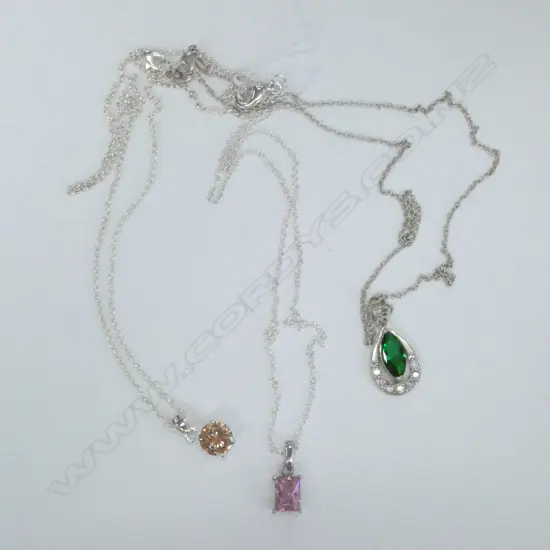 3 SILVER PENDANTS ON SILVER CHAINS