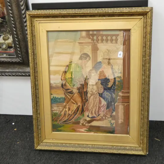 AN ANTIQUE EMBROIDERY OF JESUS/MARY AND JOESPH