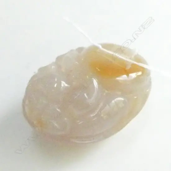 CHINESE CARVED PALE AGATE HANDLING PIECE