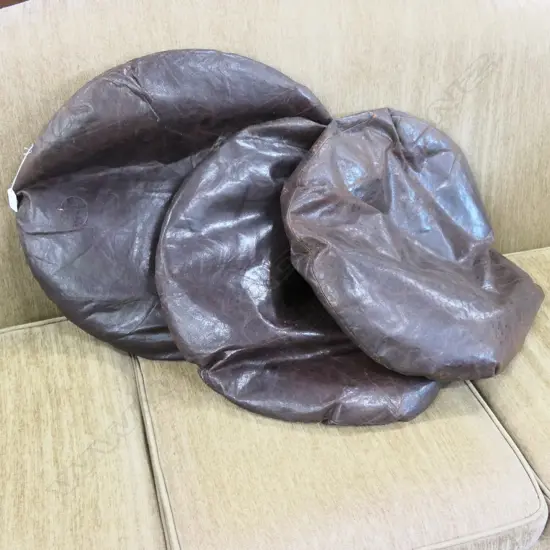 3 VINTAGE LEATHER CUSHIONS CIRCULAR