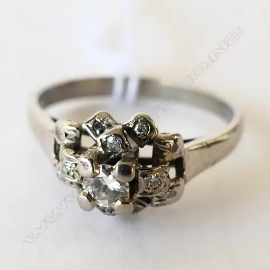 UNMARKED WHITE GOLD AND DIAMOND CLUSTER RING