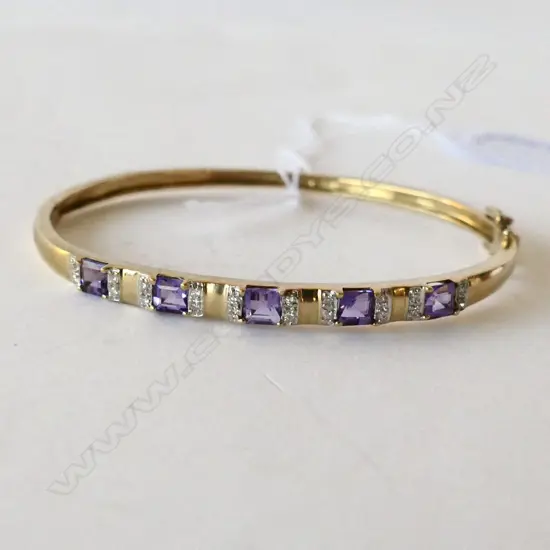 9ct GOLD AMETHYST & DIAMOND BANGLE 9.6gms