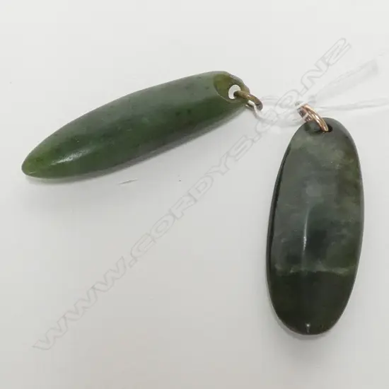 2 GREENSTONE PENDANTS 
