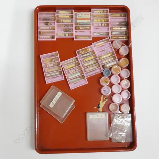 LACQUERED TRAY OF WATCH MAKERS PARTS HANDS COGS ETC