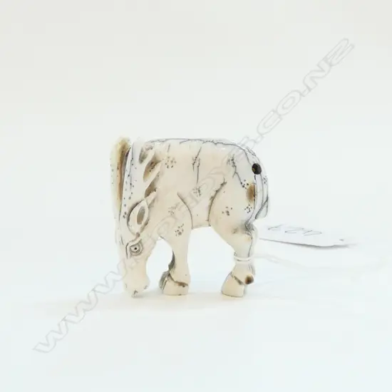 JAPANESE CARVED IVORYNETSUKE STANDING STAG