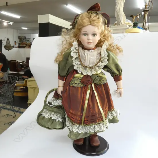 MODERN PORCELAIN COLLECTOR'S DOLL KAREN. ON STAND