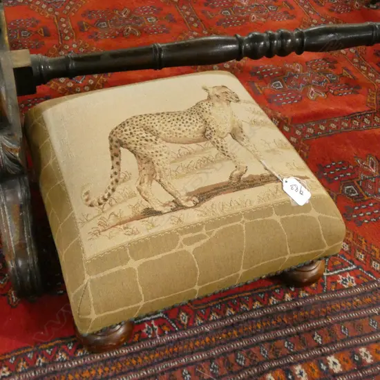 SQUARE FOOTSTOOL WITH CHEETAH DECORATED UPHOLSTRY