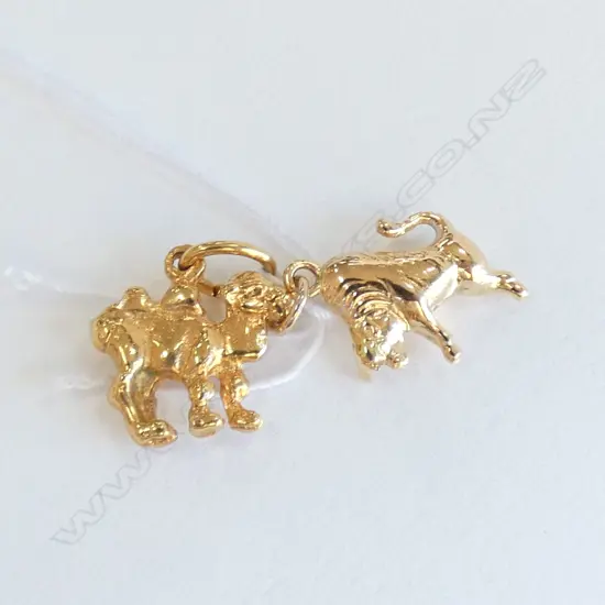 2 GOLD CHARMS CAMEL & BULL 9CT OR HIGHER