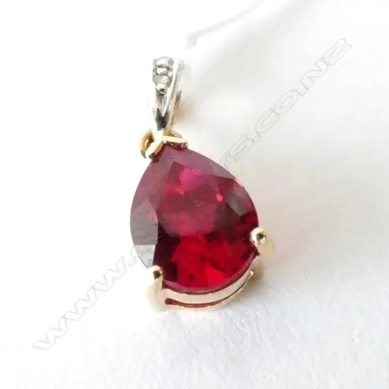 10K GOLD RED STONE PENDANT