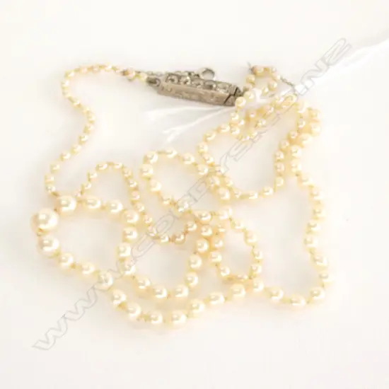 PEARL NECKLACE WITH SILVER CLASP SET WITH DIAMONDS
