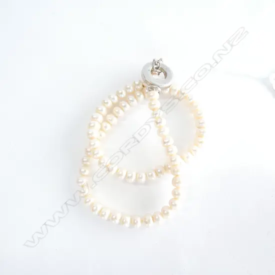 SINGLE STRAND OF 69  CULTURED PEARLS w SILVER CLASP