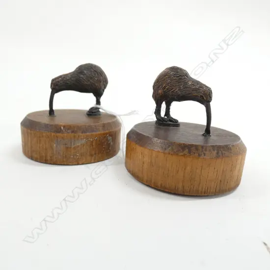 A PR OF KIWI BRONZE + KAURI PAPER WEIGHTS