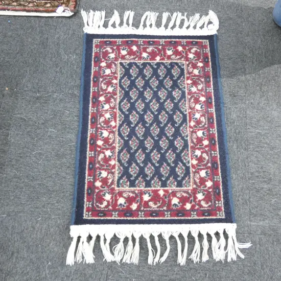 ALL WOOL BLUE BOTCH PATTERN RUG 850 X 590MM