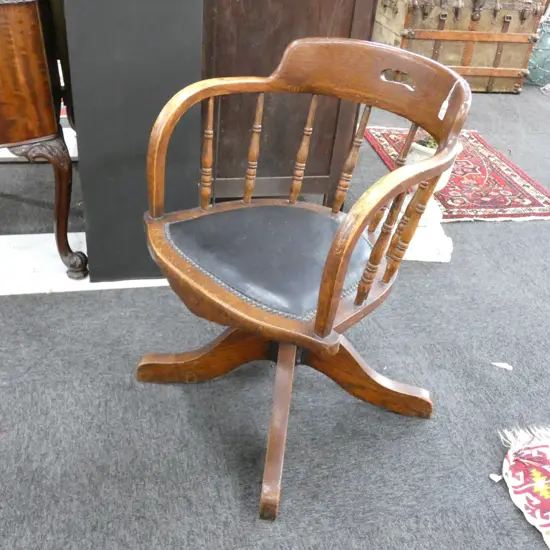 OAK SWIVEL DOUGLAS CHAIR